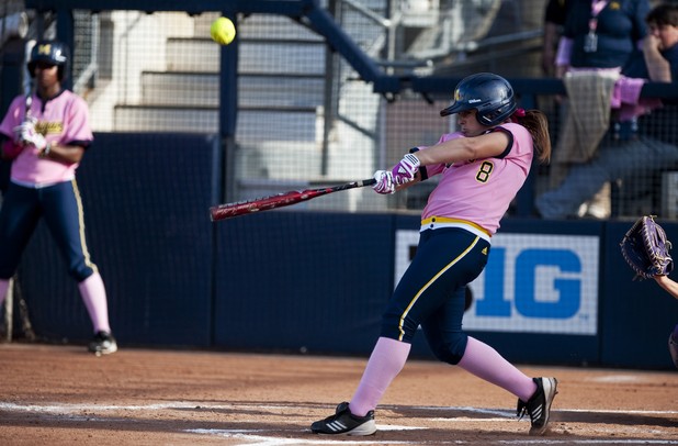 Michigan second baseman Ashley Lane makes contact with a ball in the game against Northwestern on Friday, May 3. Daniel Brenner I AnnArbor.com